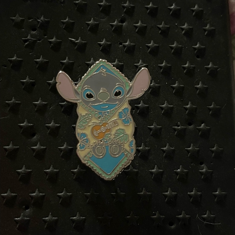 Disney stitch wrapped in blanket pin